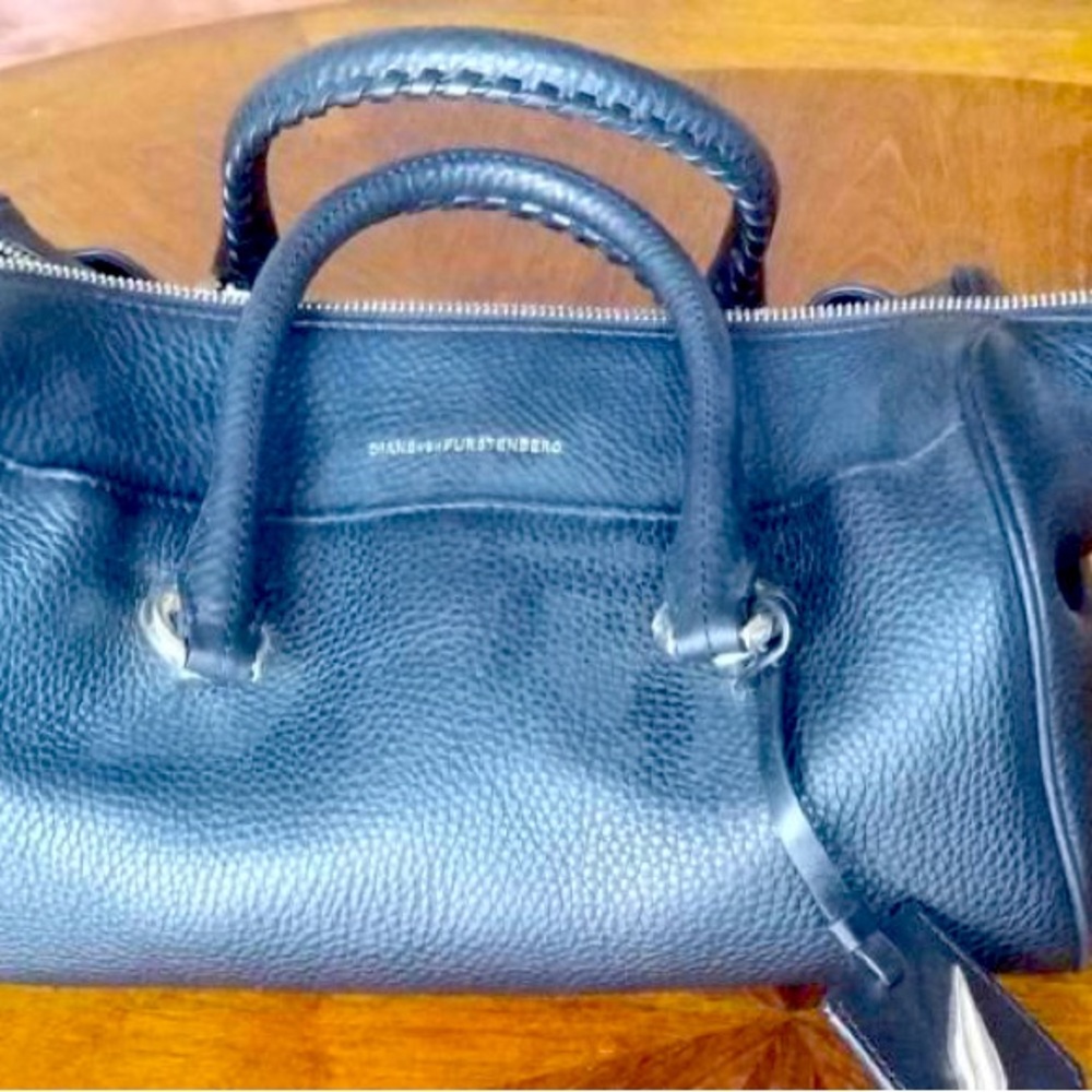 DVF Diane von Furstenberg speedy style black leather handbag. 13L x 8W x 7H